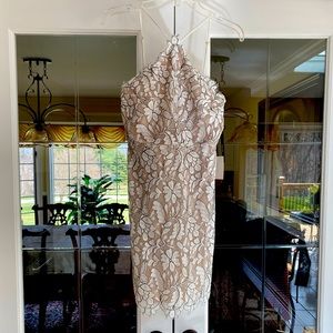 NWT- Summer dress with adjustable straps. White with a nude underlay.